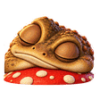 Toad asleep on top of a red toadstool.